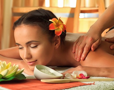 Beautiful young woman taking spa treatments at the salon.