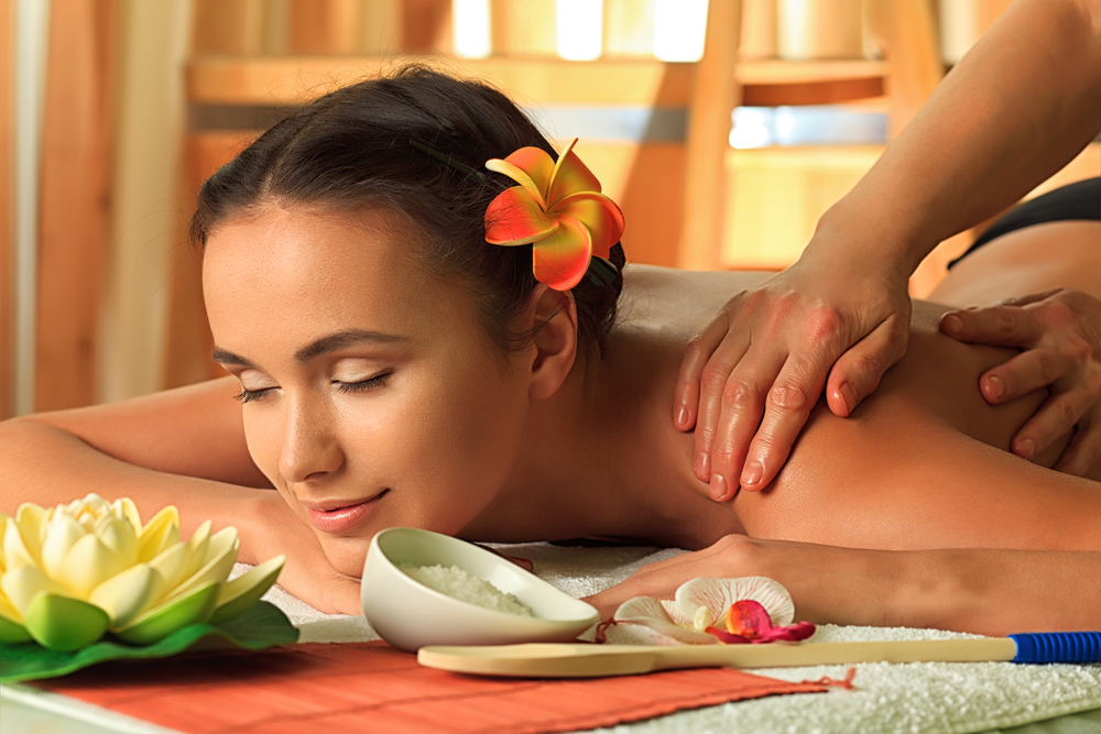 Beautiful young woman taking spa treatments at the salon.