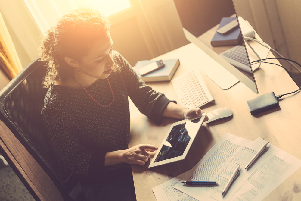 Young Woman Working at Home, Small Office